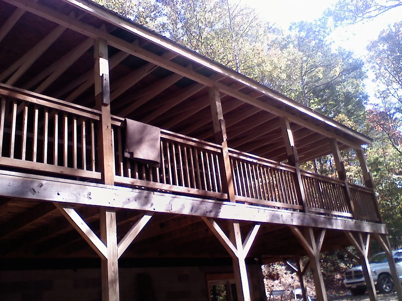 Timber framing under a new elevated porch and deck — Roof Leak Repair in San Anselmo by Roofing Brothers
